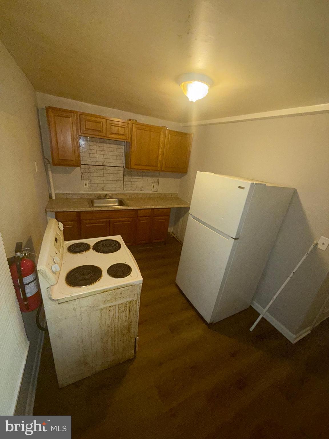 663 Kohn Street, Unit 2 Norristown, PA 19401 - Photo 19 of 23 a bathroom with a sink and mirror