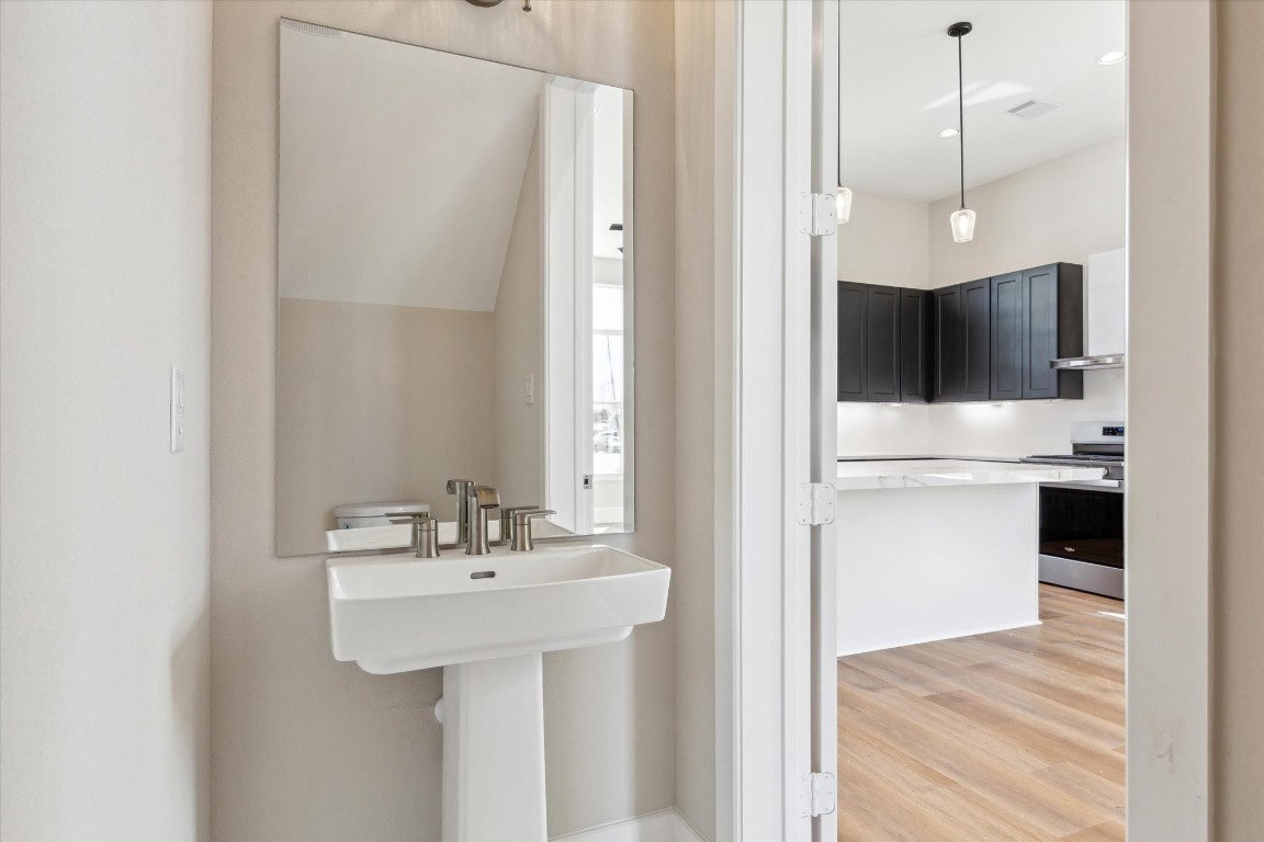 5613 Leonard Street Houston, TX 77023 - Photo 5 of 21 a view of a kitchen from the hallway