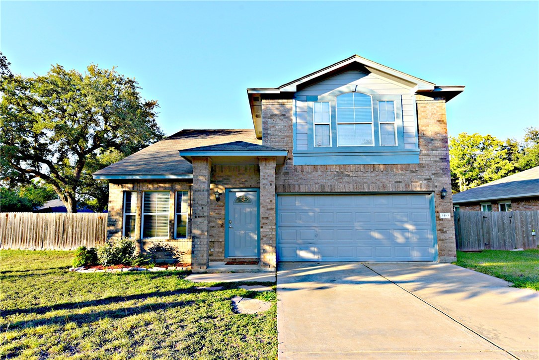 3463 Flowstone Lane Round Rock, TX 78681 - Photo 1 of 1 a front view of a house with a yard and garage