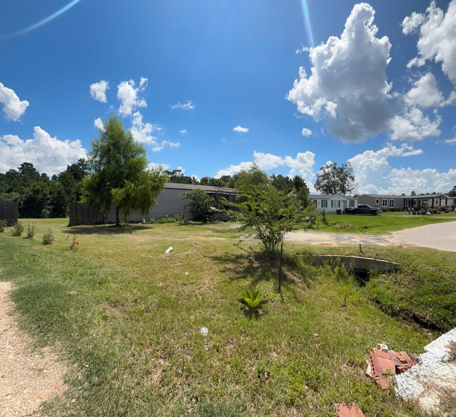 5605 Frst Vista Court Conroe, TX 77306 - Photo 21 of 34 a view of a lake with a yard