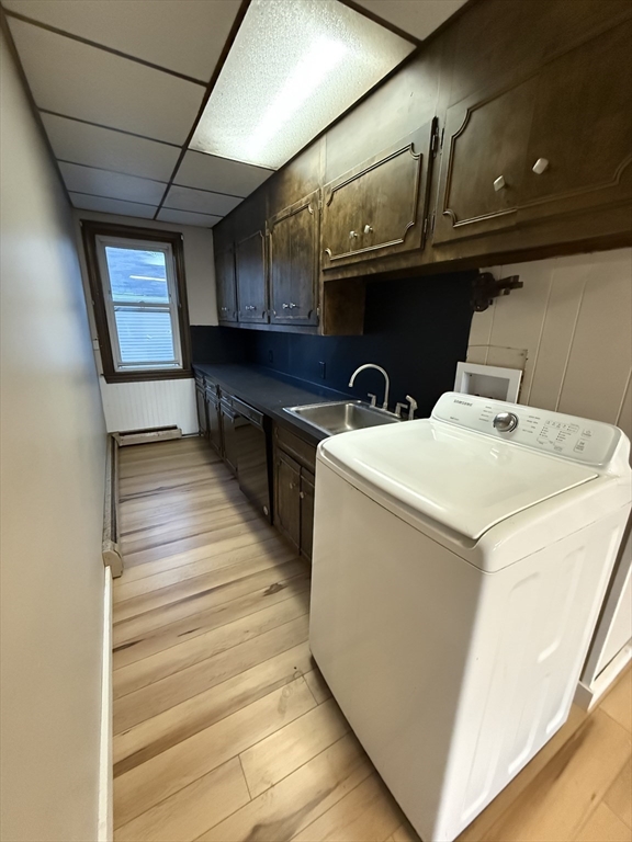 92 Stanton Street, Unit 3 Worcester, MA 01605 - Photo 10 of 18 a utility room with dryer and washer