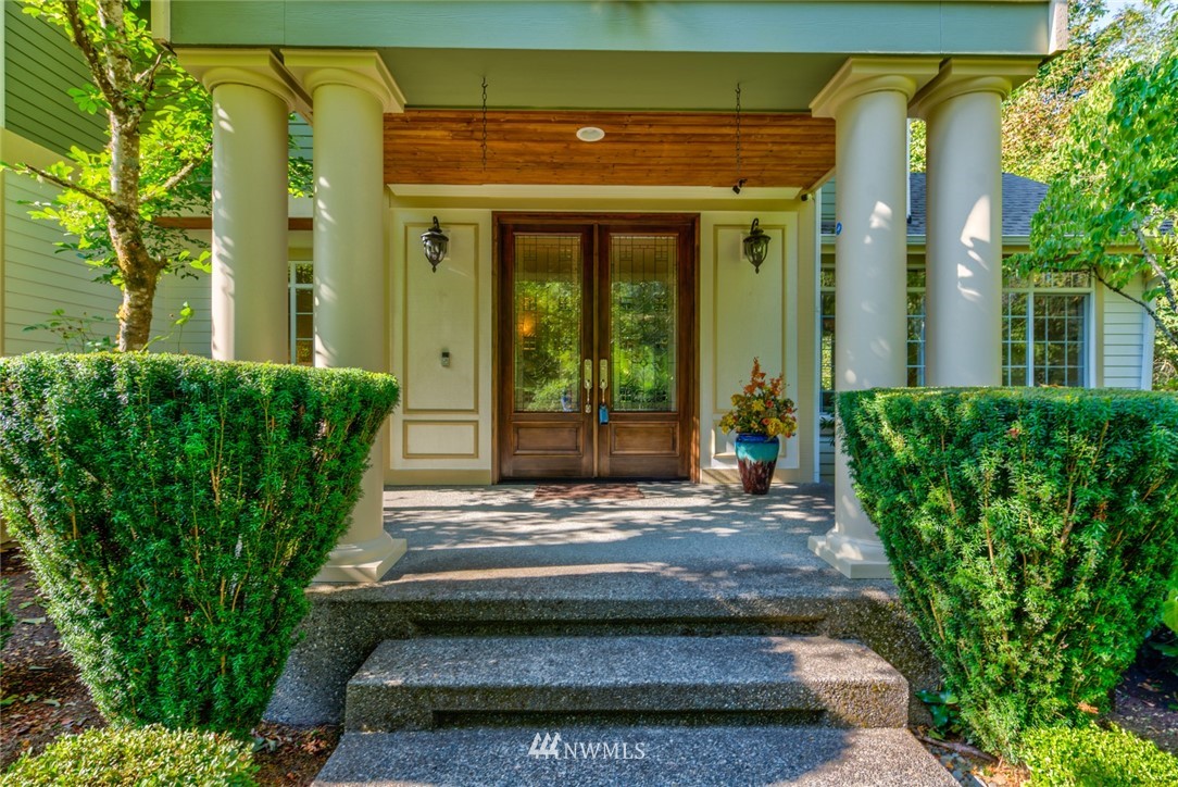 18416 Southeast 195th Place Renton, WA 98058 - Photo 3 of 32 a house view with a garden space