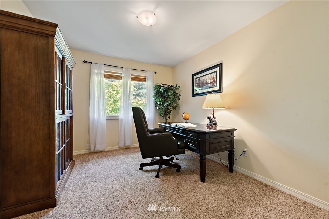 18416 Southeast 195th Place Renton, WA 98058 - Photo 24 of 32 a view of a workspace with furniture and a window