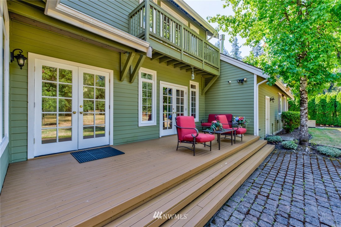 18416 Southeast 195th Place Renton, WA 98058 - Photo 29 of 32 a view of a chairs in a back yard of the house