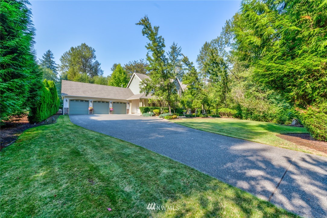 18416 Southeast 195th Place Renton, WA 98058 - Photo 32 of 32 a view of a house with a yard