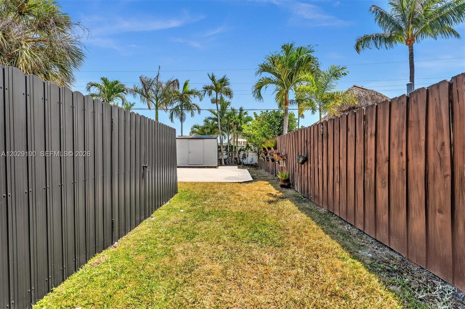 11790 Southwest 34th Street Miami, FL 33175 - Photo 54 of 56 a view of a backyard with a trees