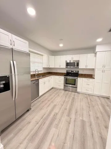 $409,500 | 7064 Woodmont Avenue, Tamarac, FL 33321