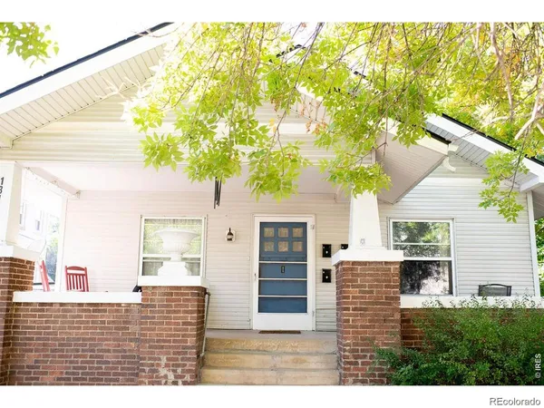 a view of outdoor space and front view of a house