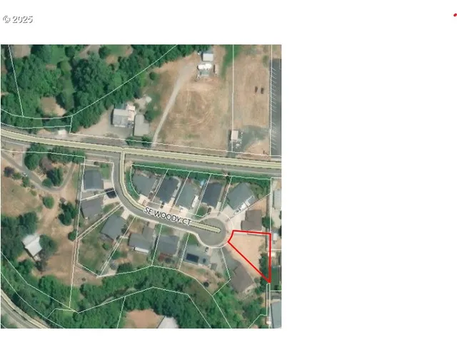 a view of a room with a bench and white floor