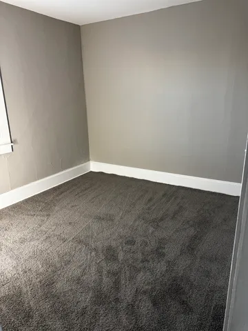 an empty room with an entryway