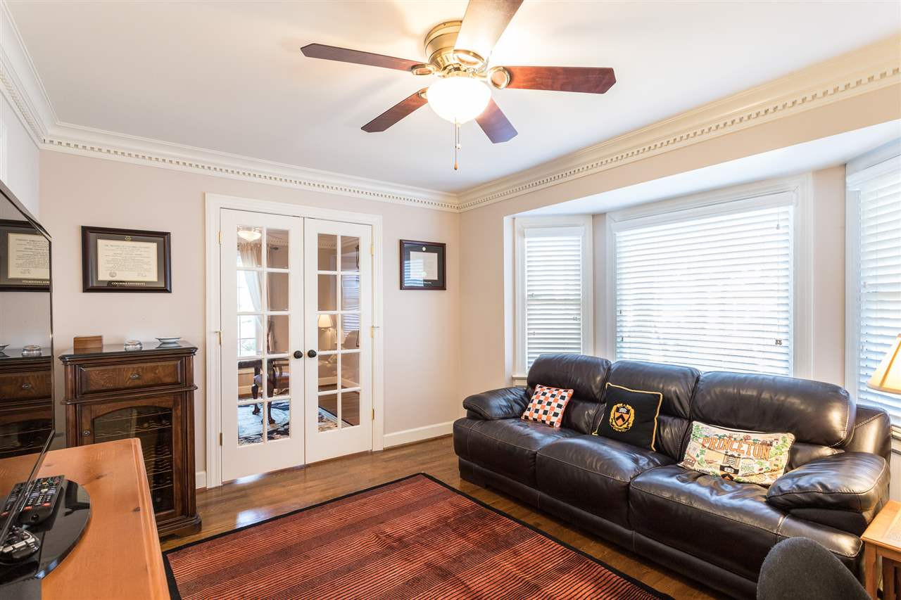 7728 Rainwater Road Raleigh, NC 27615 - Photo 12 of 30 Beautiful hardwood floors, crown molding, ceiling fan, smooth ceilings, and glass French doors. 1st Floor Office or Den