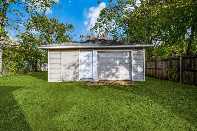 a view of backyard with green space