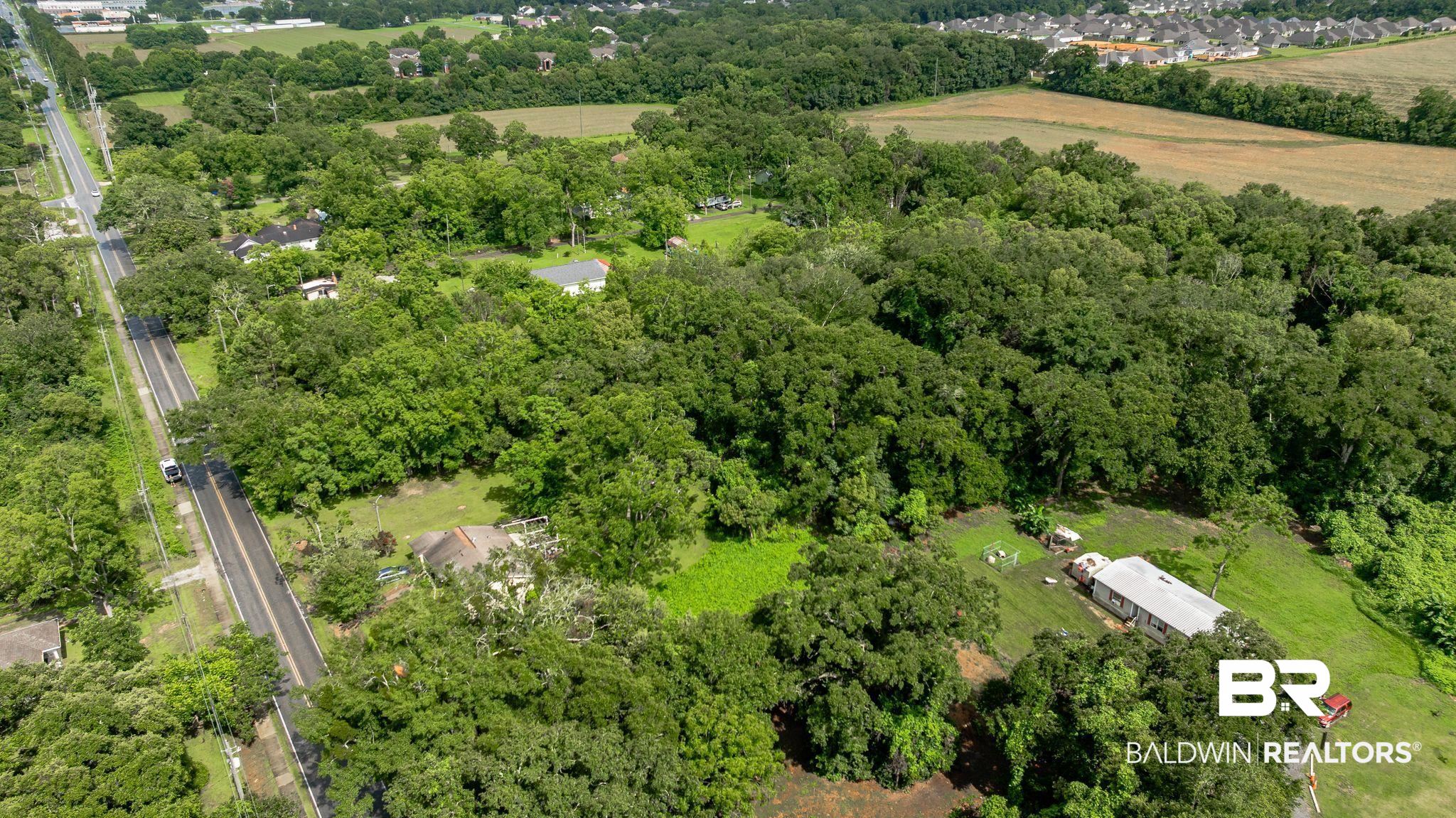 7360 Twin Beech Road Fairhope, AL 36532 - Photo 14 of 16 Aerial view of property and surrounding area