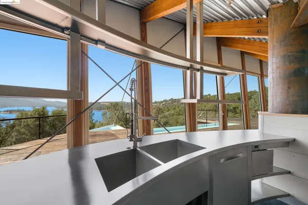 a view of balcony with wooden floor
