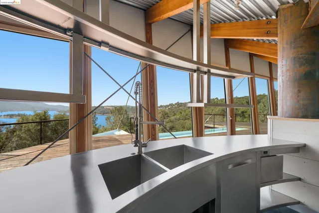 a view of balcony with wooden floor