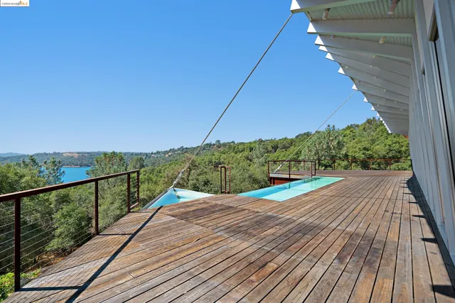 a view of a balcony with mountain view