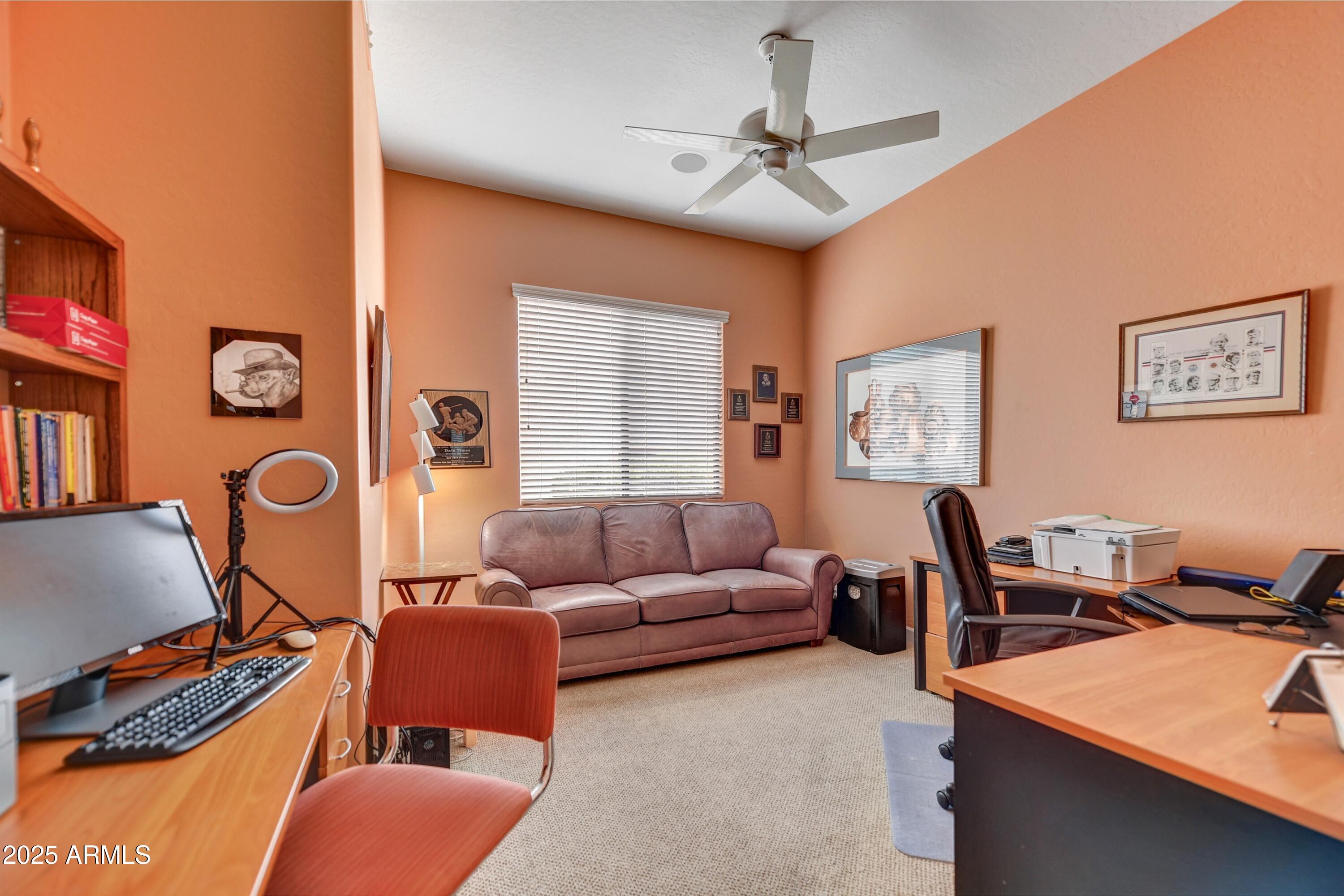 19057 East Alondra Way Rio Verde, AZ 85263 - Photo 14 of 21 a living room with furniture and a window