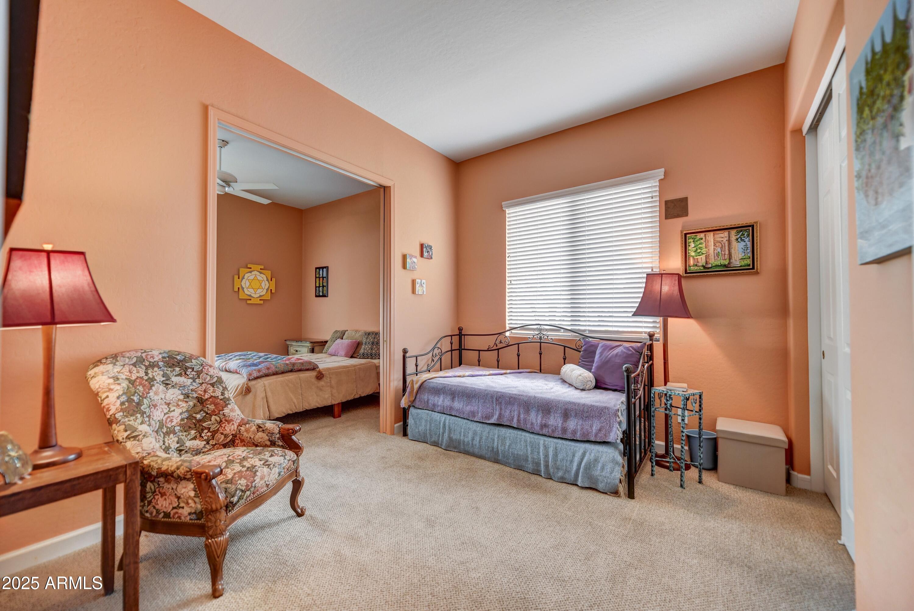 19057 East Alondra Way Rio Verde, AZ 85263 - Photo 15 of 21 a living room with furniture and a lamp
