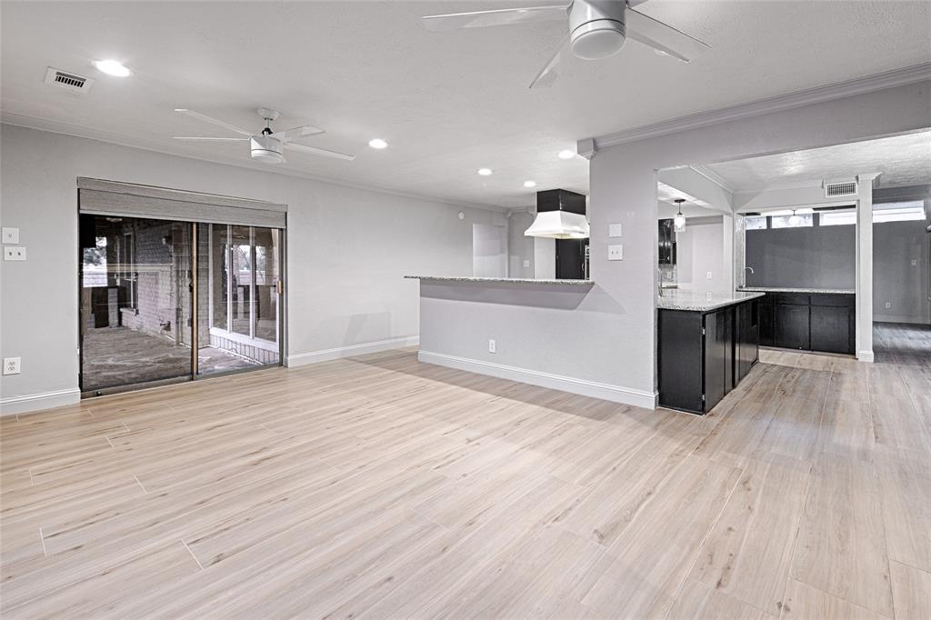 509 North Durango Circle Irving, TX 75062 - Photo 15 of 39 a view of a kitchen with a sink and a refrigerator