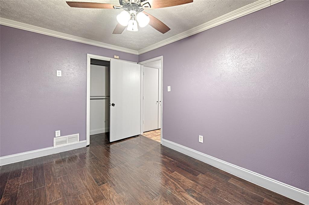 509 North Durango Circle Irving, TX 75062 - Photo 24 of 39 a view of an empty room with wooden floor