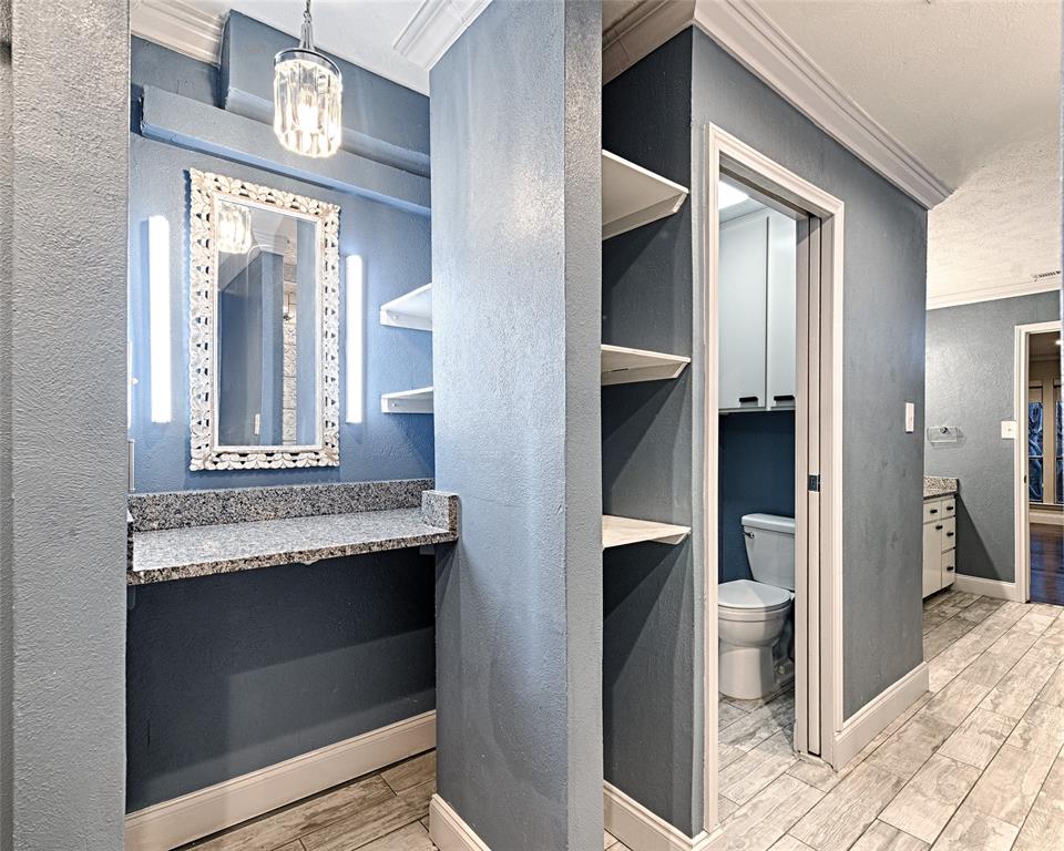 509 North Durango Circle Irving, TX 75062 - Photo 30 of 39 a bathroom with a granite countertop sink and a mirror