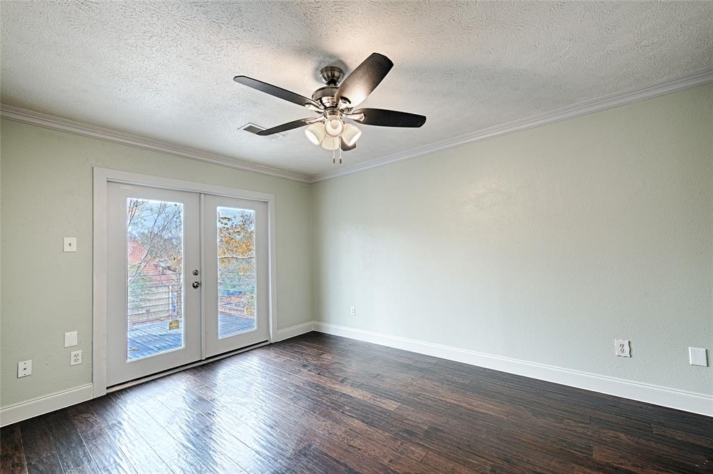 509 North Durango Circle Irving, TX 75062 - Photo 34 of 39 a view of an empty room with wooden floor and a window
