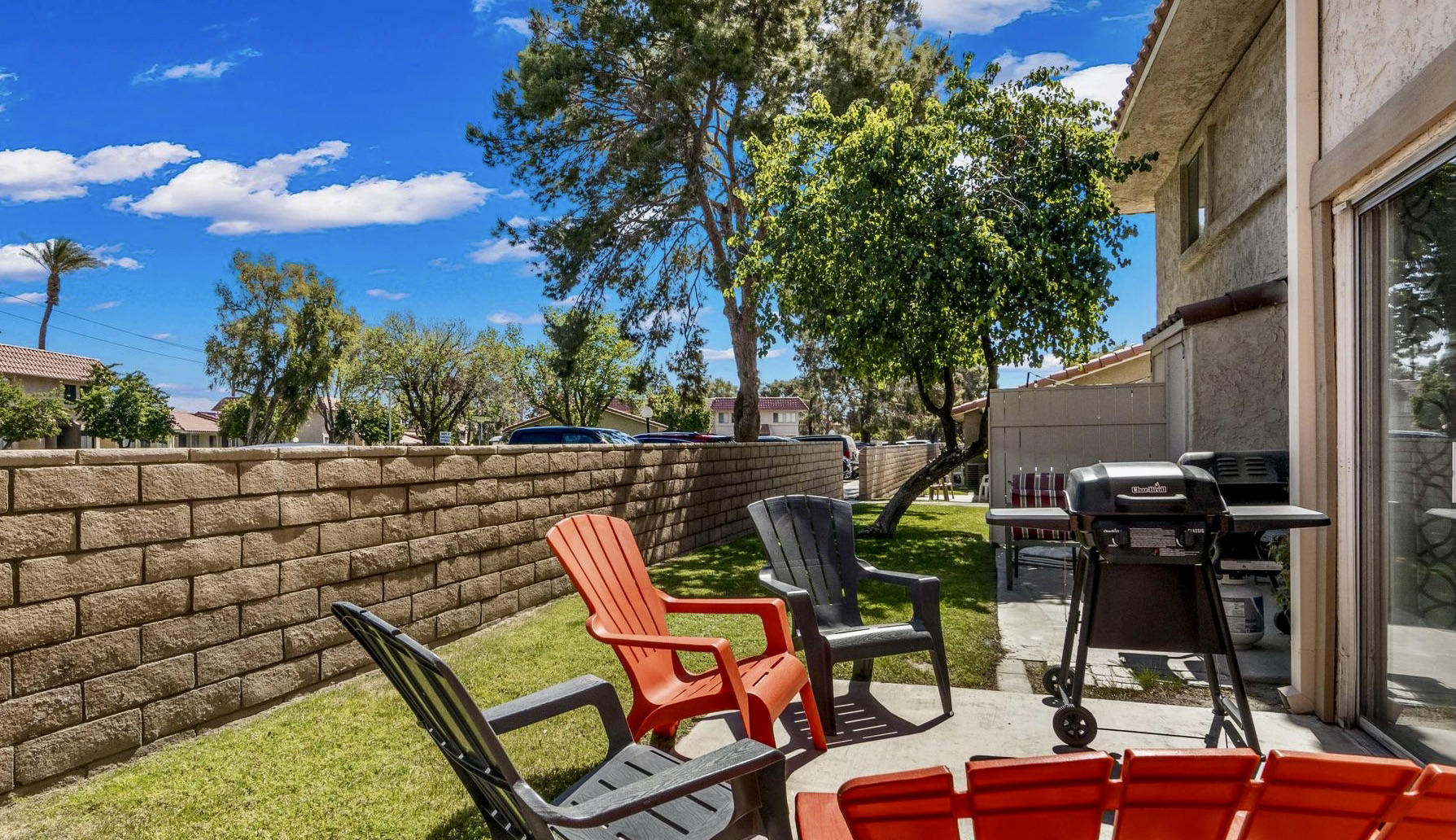 82567 Ave 48, Unit 12 Indio, CA 92201 - Photo 15 of 23 a view of an chairs and tables in patio
