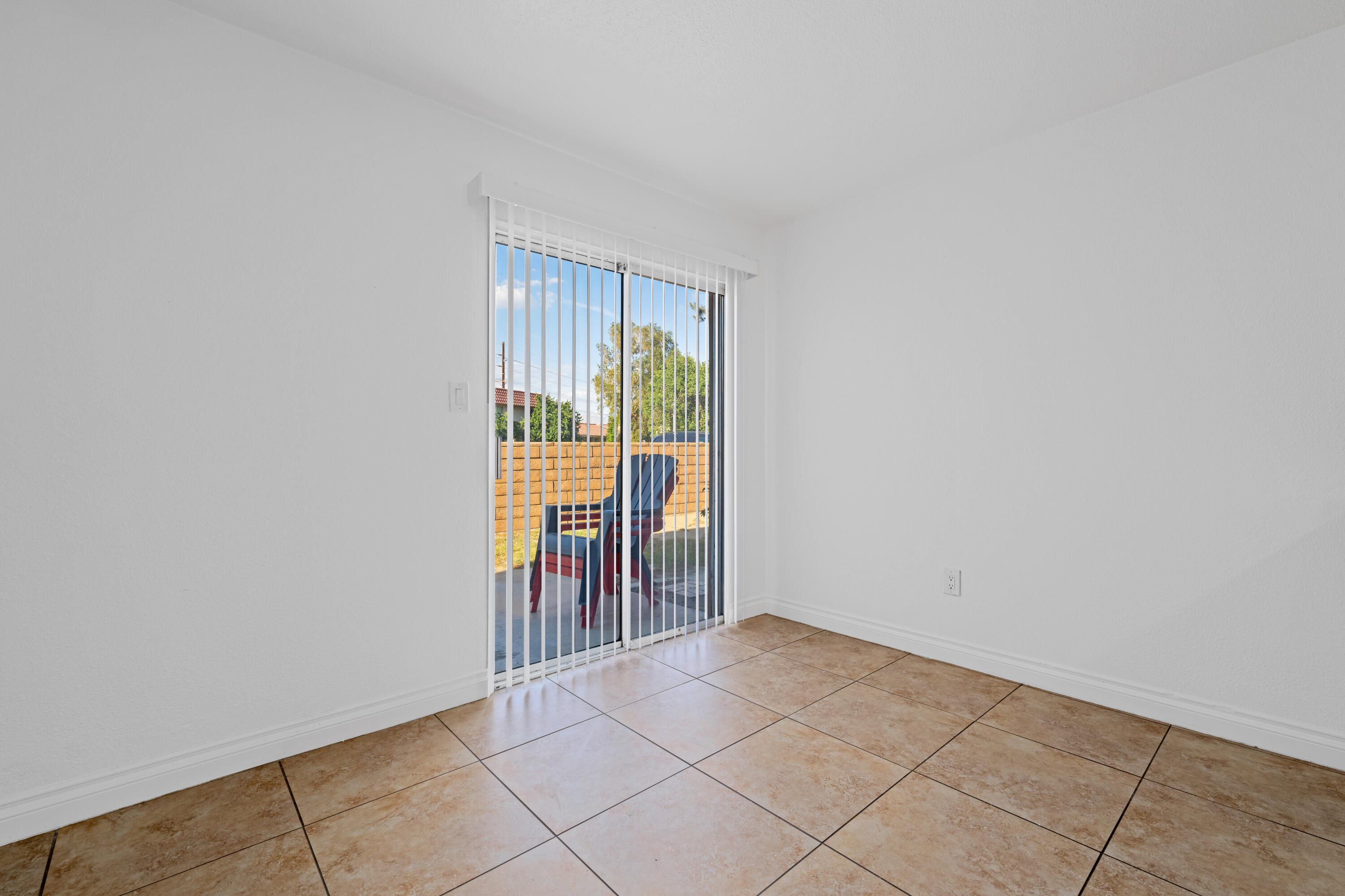 82567 Ave 48, Unit 12 Indio, CA 92201 - Photo 7 of 23 an empty room with windows
