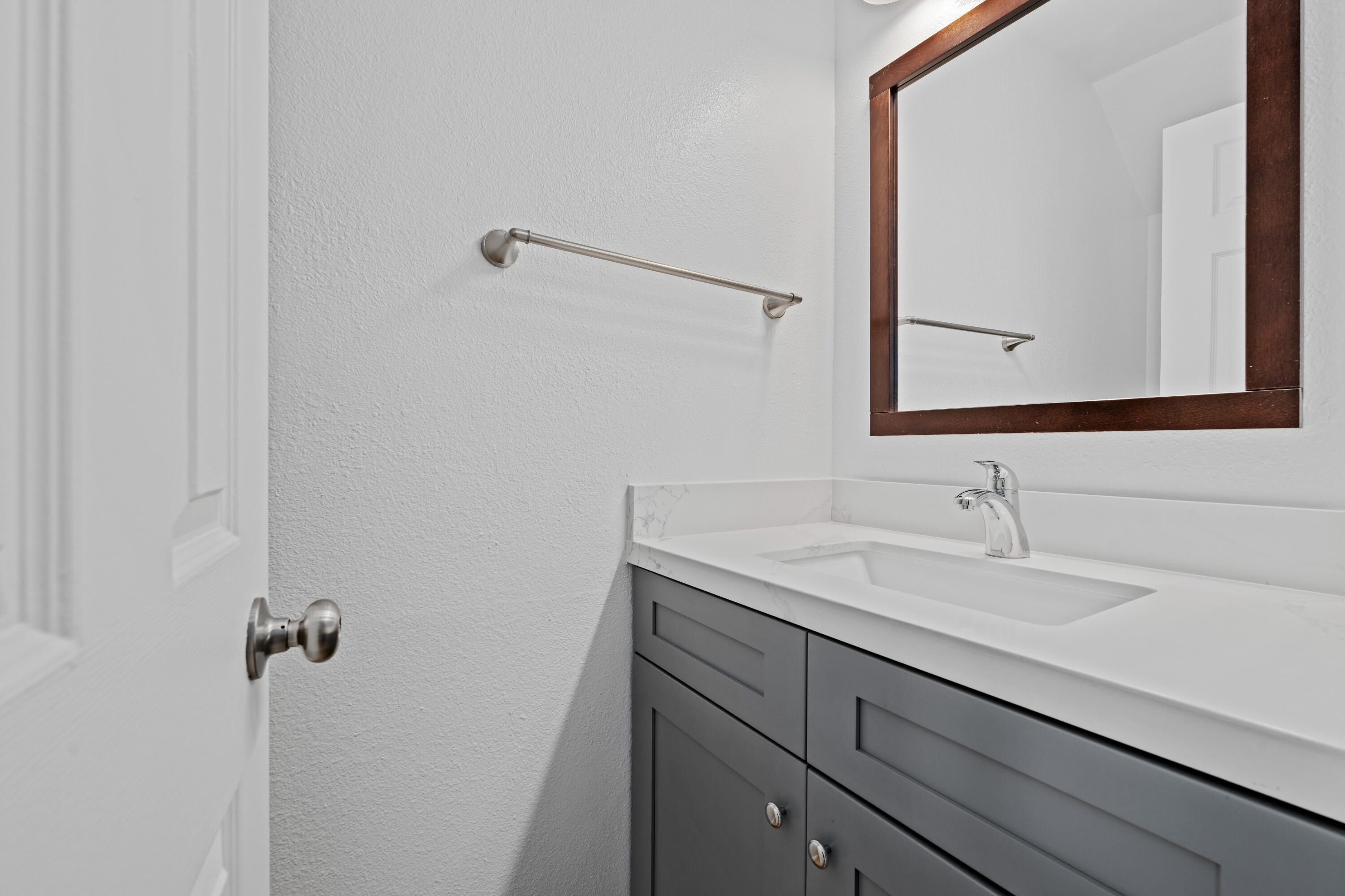 82567 Ave 48, Unit 12 Indio, CA 92201 - Photo 8 of 23 a bathroom with a sink and a mirror