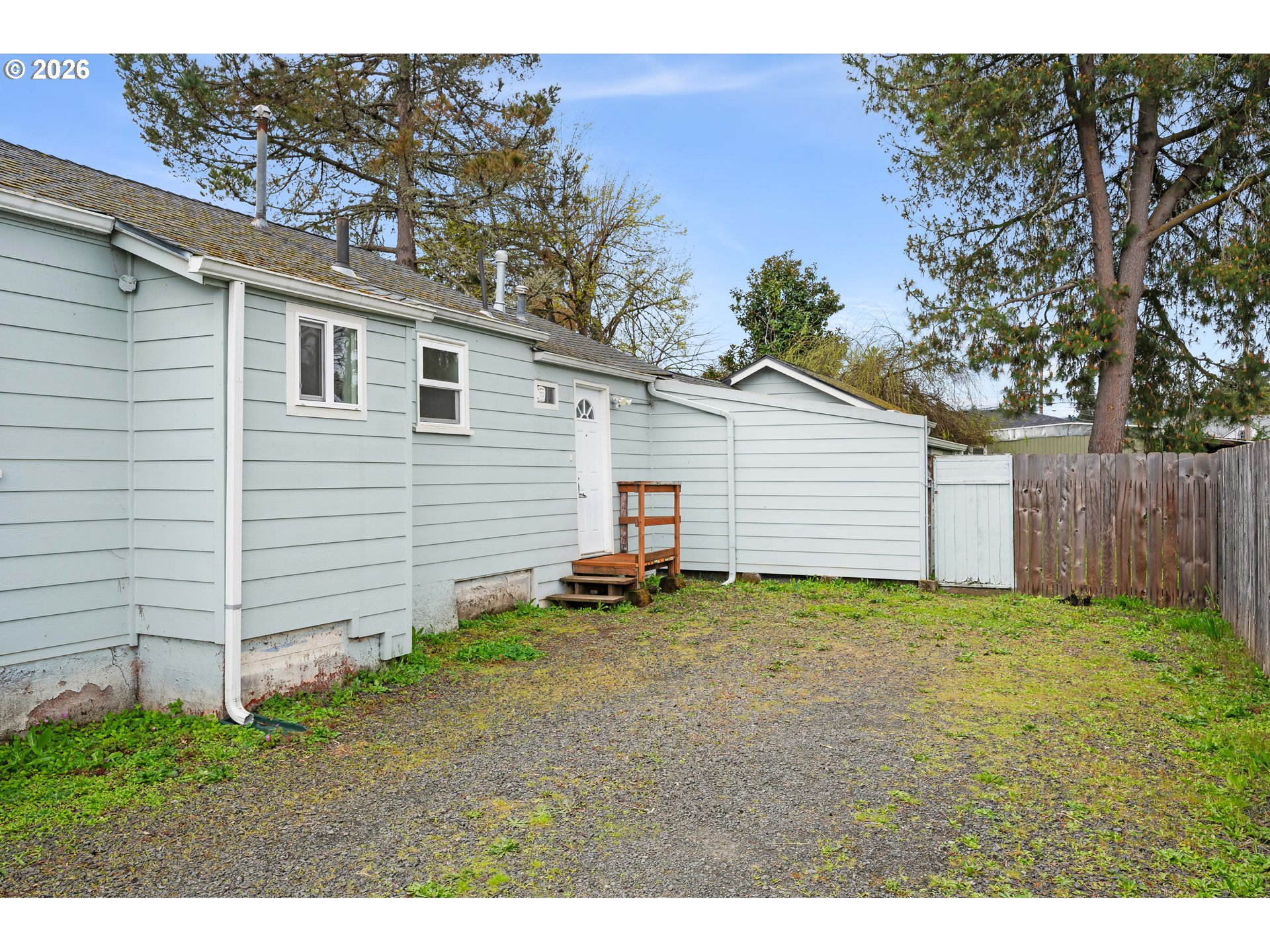 1107 South 7th Street Cottage Grove, OR 97424 - Photo 32 of 34 a view of a backyard of the house