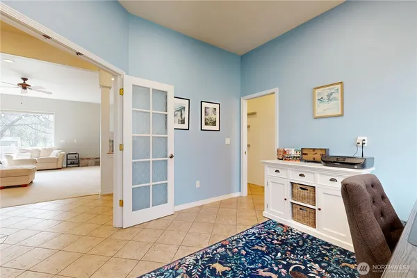 a workspace with furniture and window