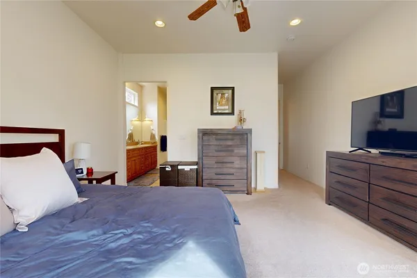 a bedroom with a bed and furniture