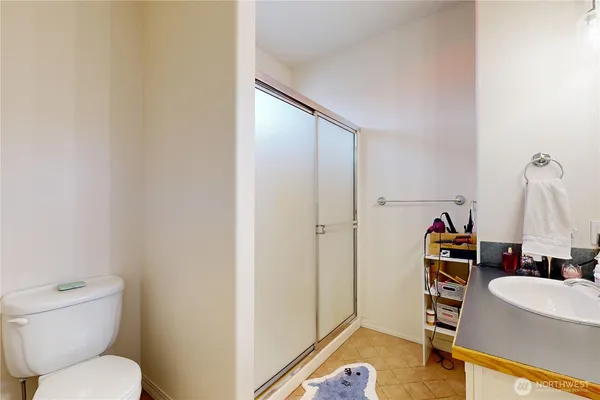 a bathroom with a toilet and a sink