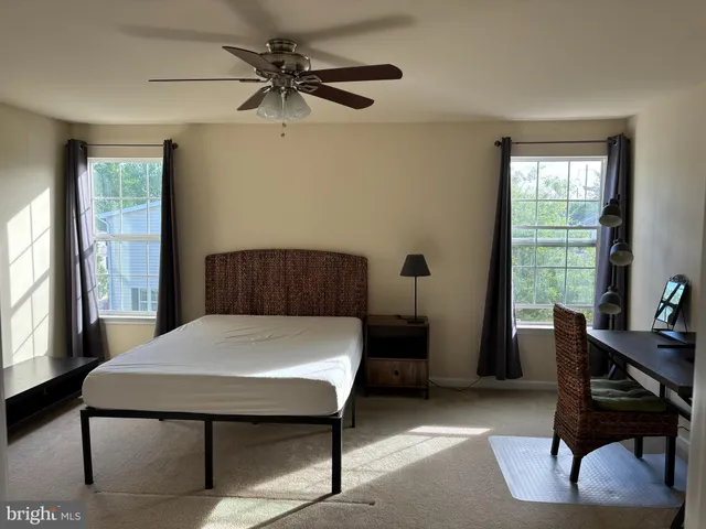 a view of a livingroom with furniture