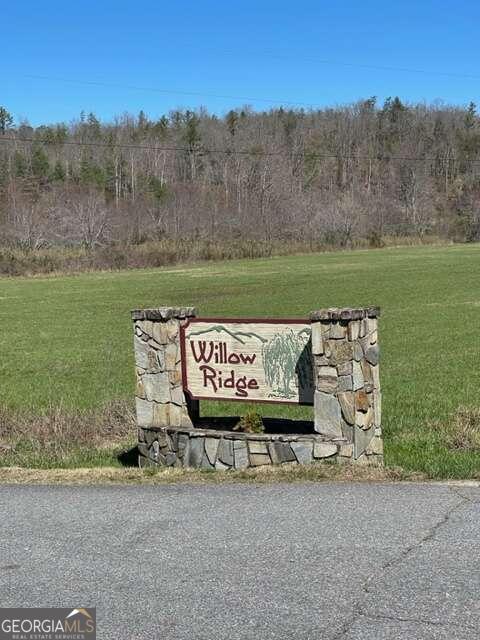 Lot 6 Willow Ridge Warne, NC 28909 - Photo 4 of 14 a sign that is on the side of the road
