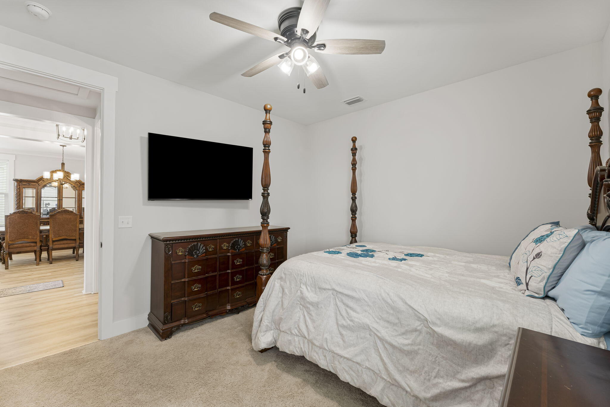 1921 Rushes Avenue Panama City, FL 32405 - Photo 11 of 43 a bedroom with a bed and a flat screen tv
