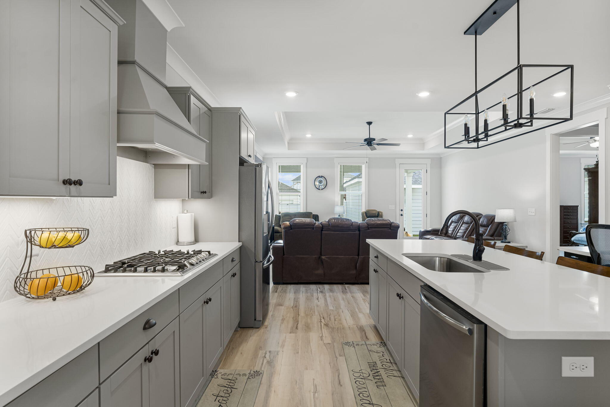 1921 Rushes Avenue Panama City, FL 32405 - Photo 15 of 43 a kitchen with stainless steel appliances granite countertop a sink stove and refrigerator