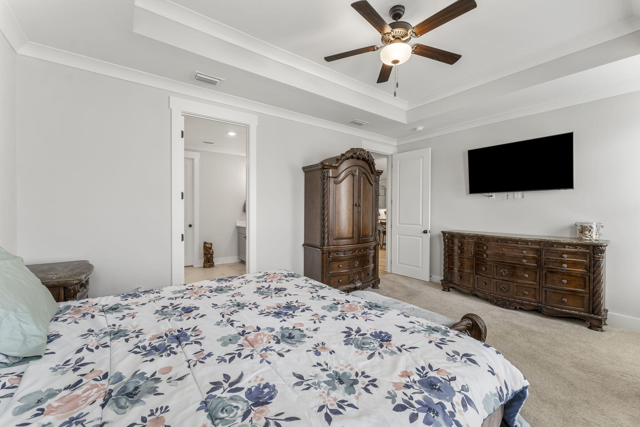 1921 Rushes Avenue Panama City, FL 32405 - Photo 22 of 43 a bedroom with a bed and a flat screen tv