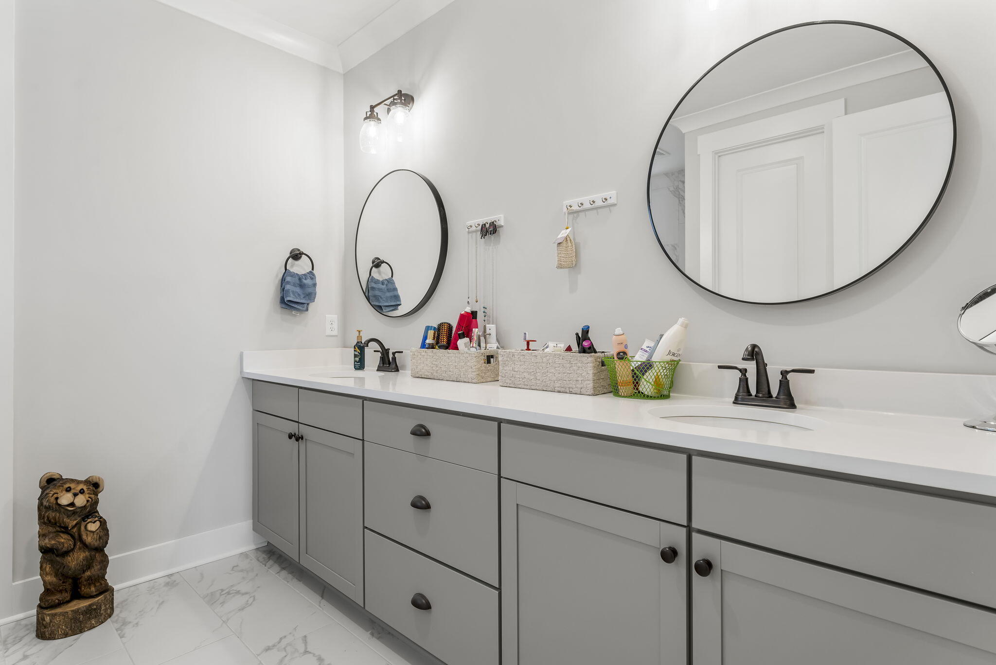 1921 Rushes Avenue Panama City, FL 32405 - Photo 24 of 43 a bathroom with a sink and a mirror