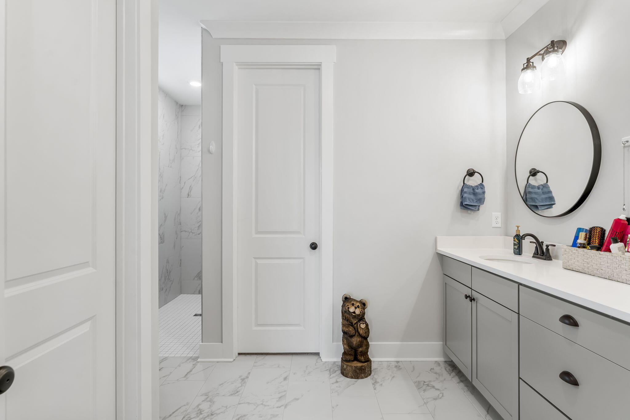 1921 Rushes Avenue Panama City, FL 32405 - Photo 25 of 43 a bathroom with a sink and a mirror
