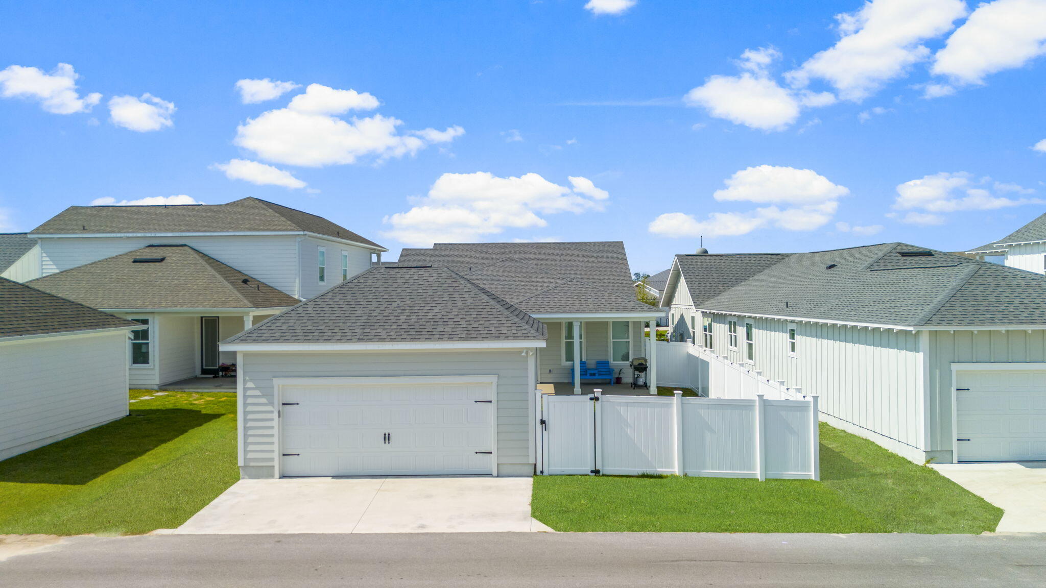 1921 Rushes Avenue Panama City, FL 32405 - Photo 31 of 43 a front view of a house with a yard and garage