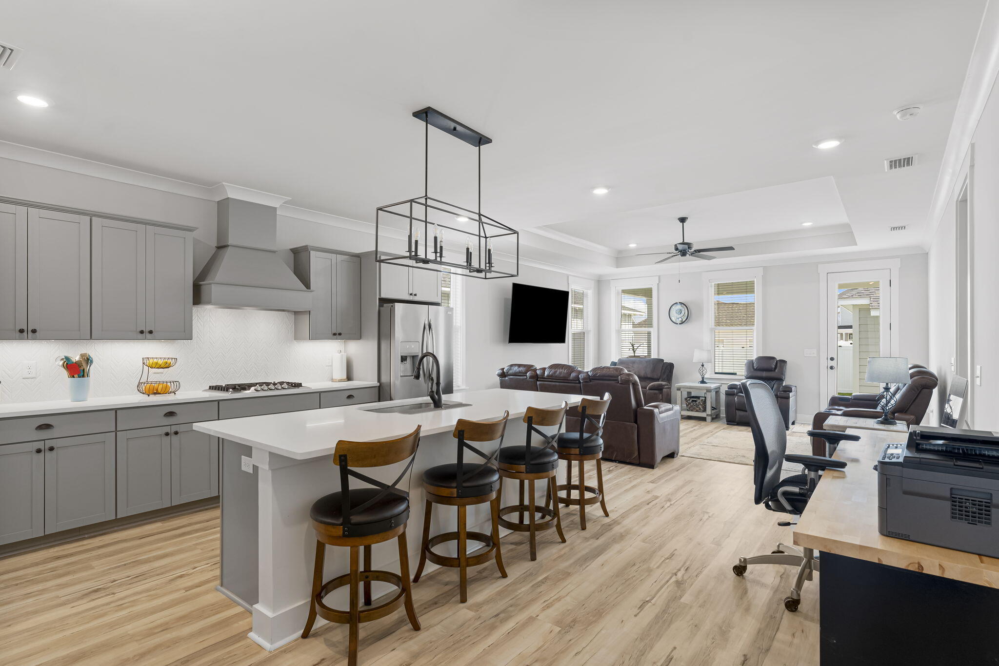 1921 Rushes Avenue Panama City, FL 32405 - Photo 4 of 43 a kitchen with stainless steel appliances a stove a sink a dining table and chairs