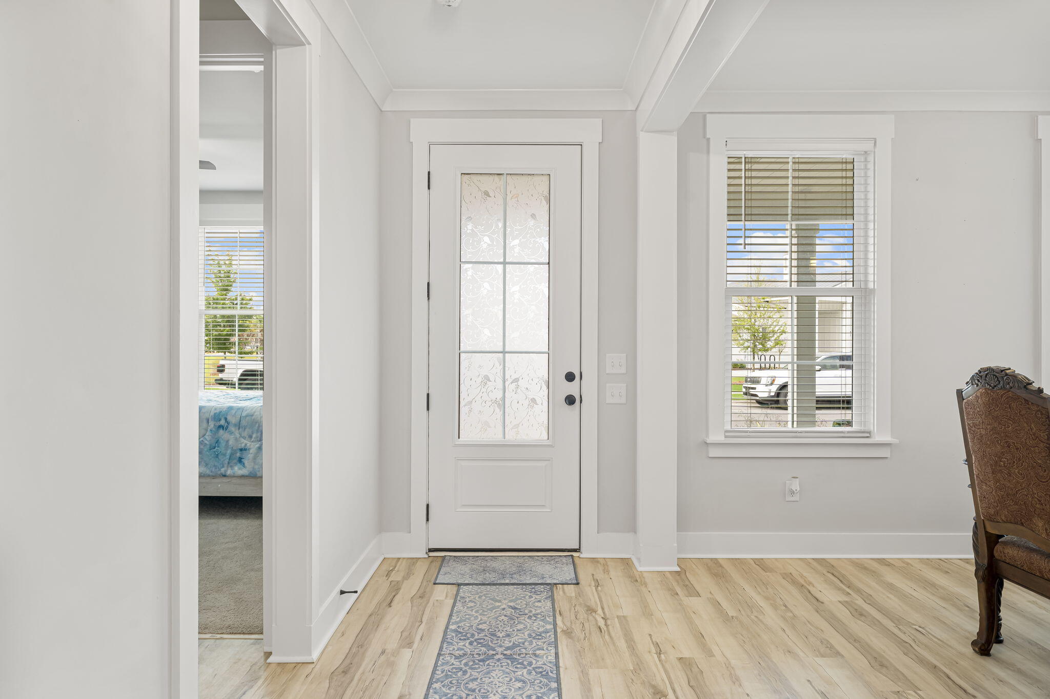 1921 Rushes Avenue Panama City, FL 32405 - Photo 5 of 43 a view of a livingroom with wooden floor and a window