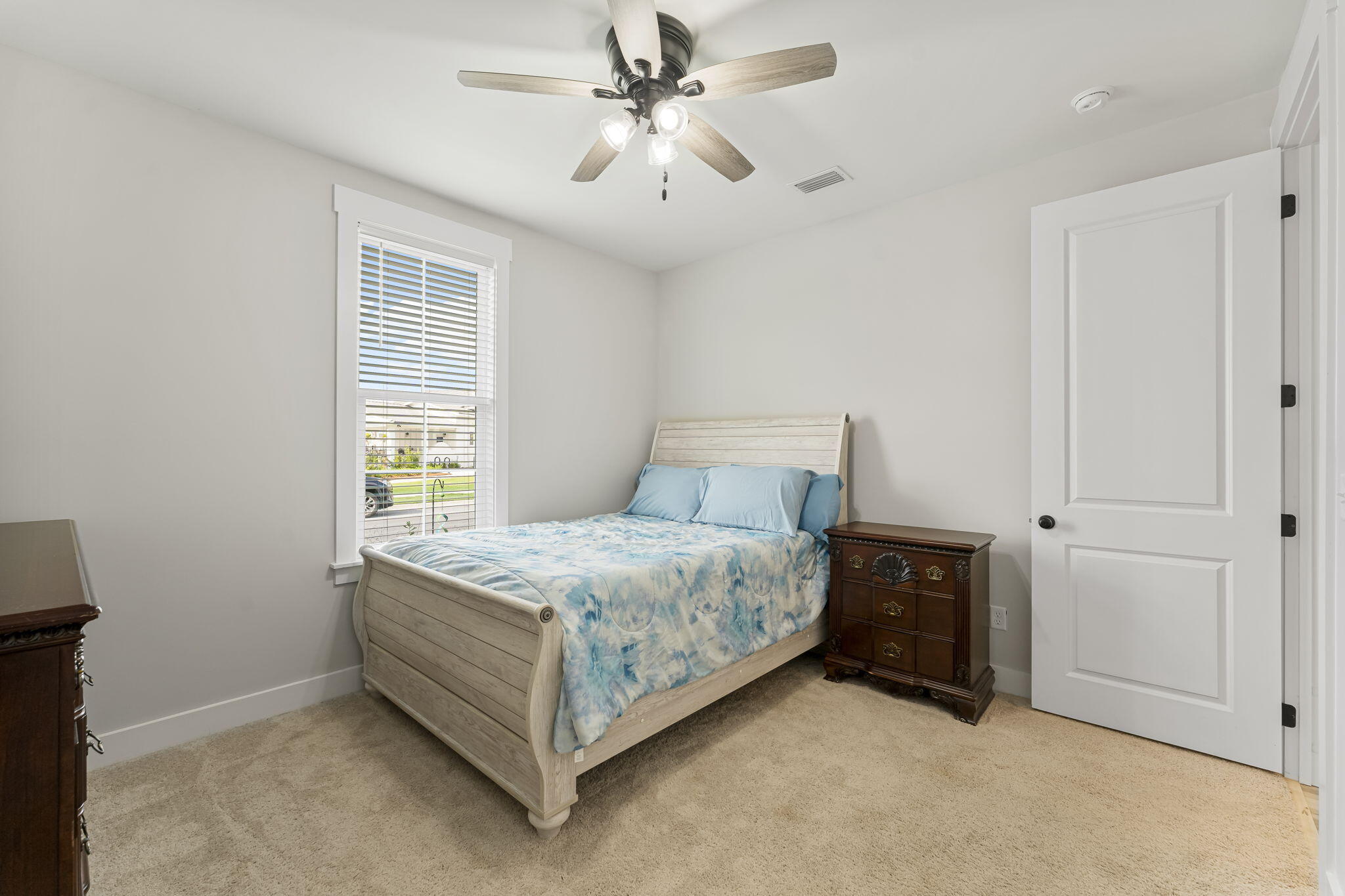 1921 Rushes Avenue Panama City, FL 32405 - Photo 9 of 43 a bedroom with a bed and a window