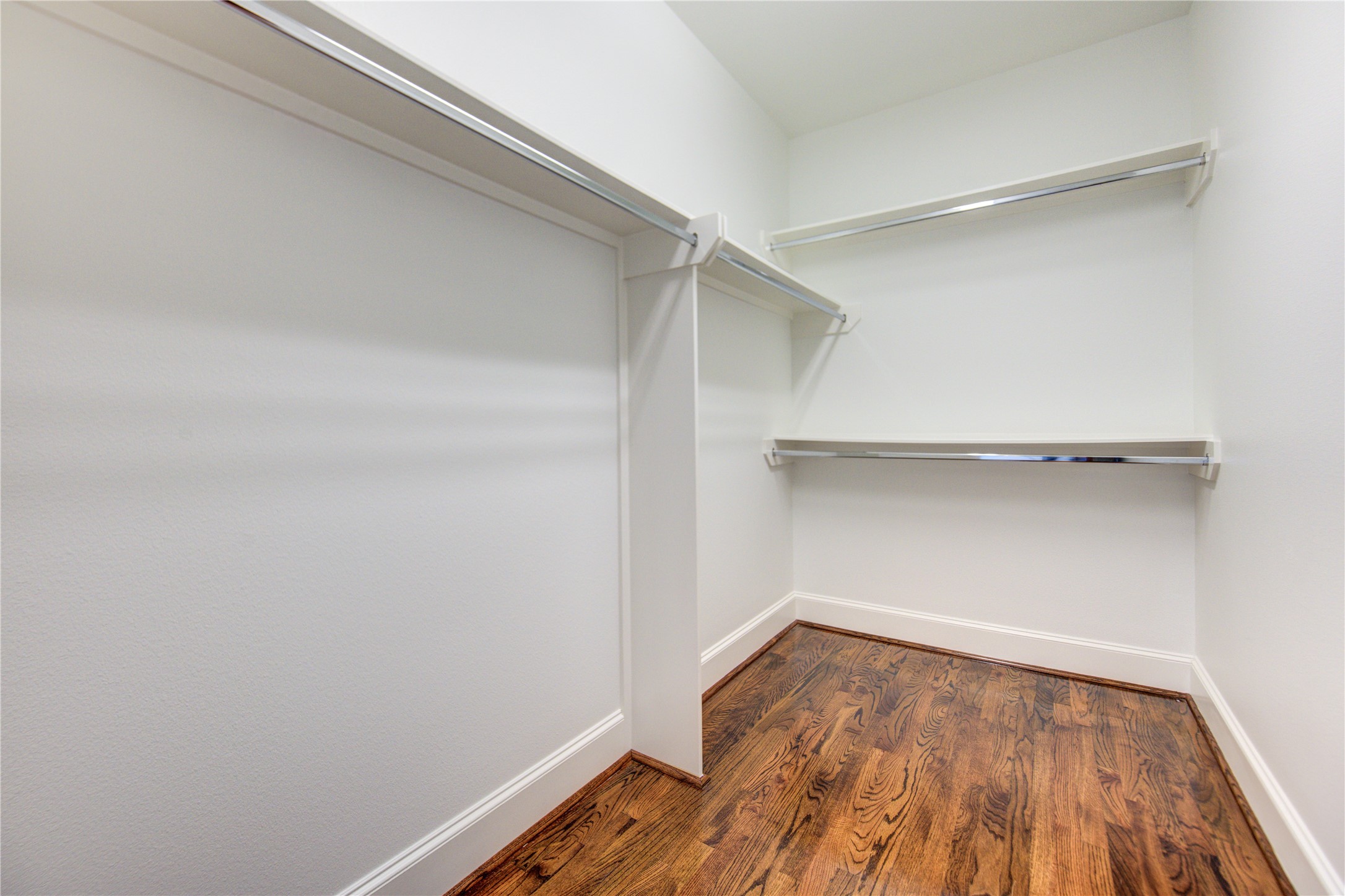 6520 Rodrigo Street Houston, TX 77007 - Photo 37 of 44 Walk-in closet for the third-floor secondary bedroom with ample hanging space and storage.
