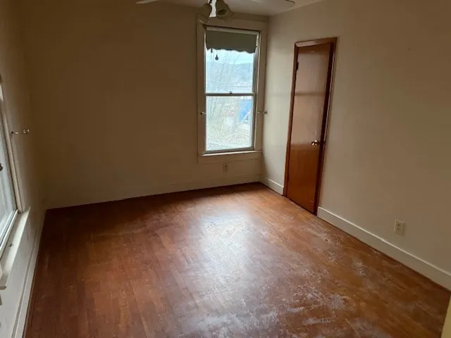 an empty room with windows
