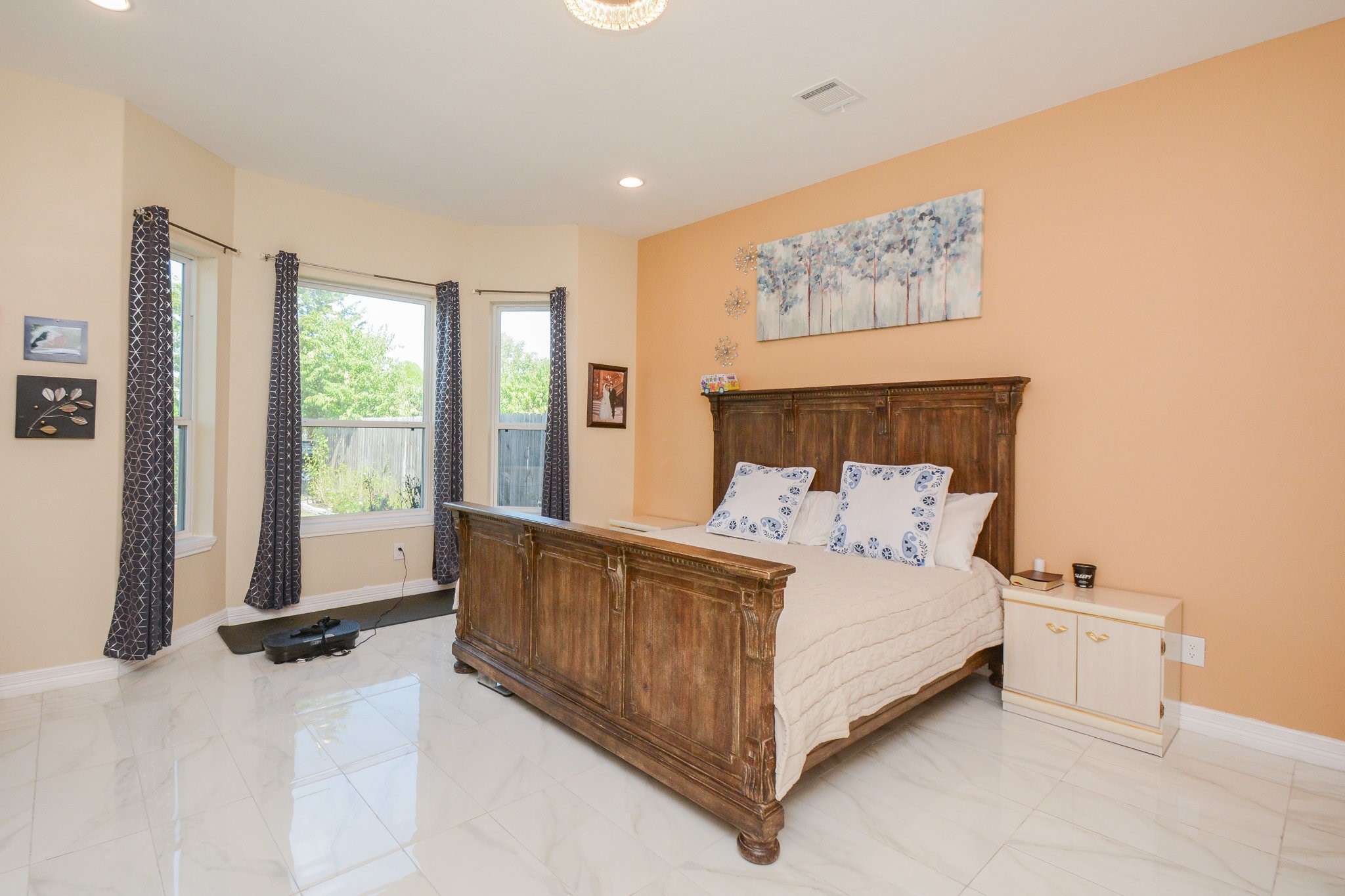 5513 Lotus Street Houston, TX 77085 - Photo 16 of 50 a bed room with a bed and a large window