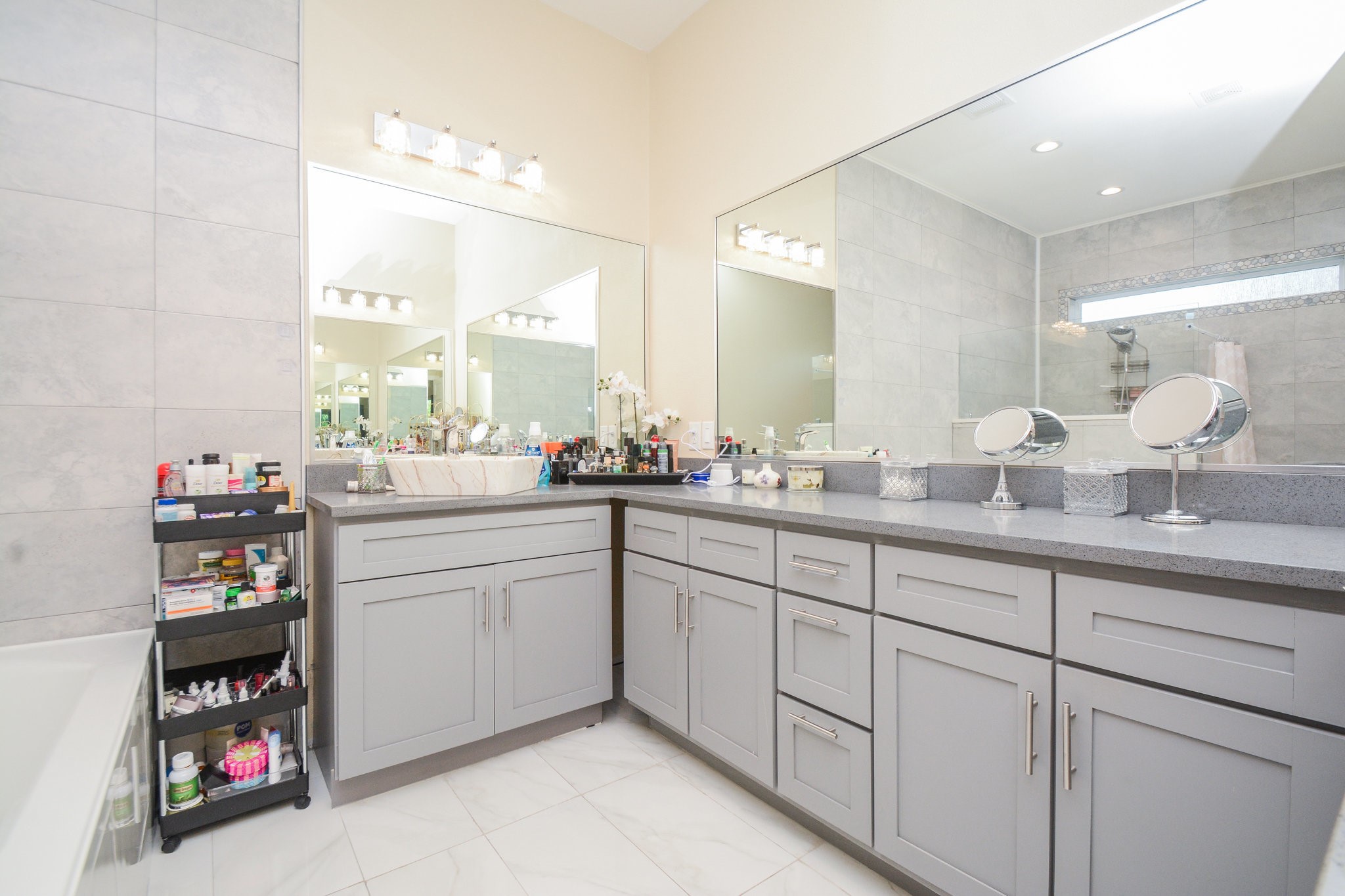 5513 Lotus Street Houston, TX 77085 - Photo 24 of 50 a bathroom with a sink and a mirror
