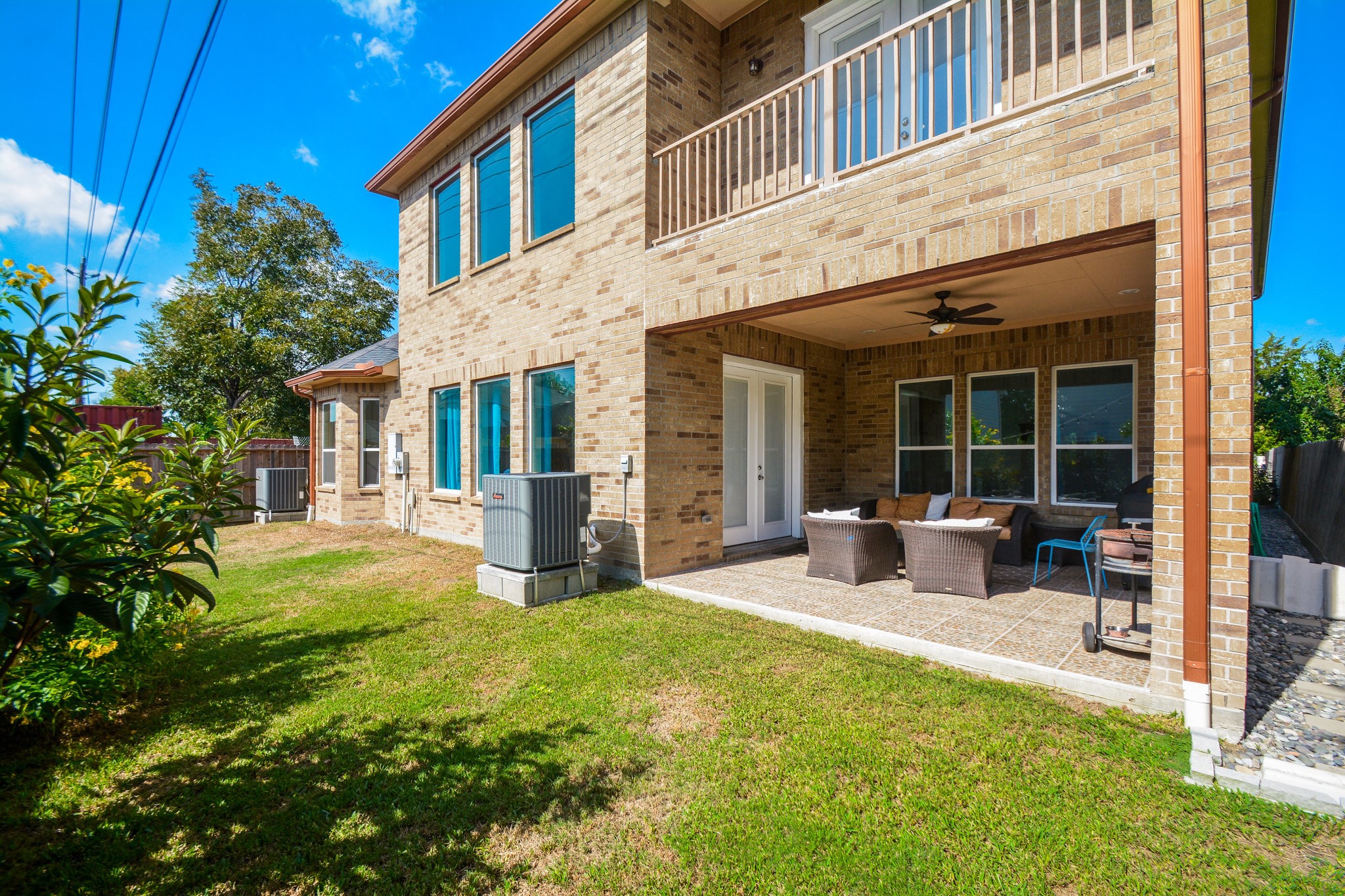 5513 Lotus Street Houston, TX 77085 - Photo 29 of 50 a view of a house with backyard porch and sitting area