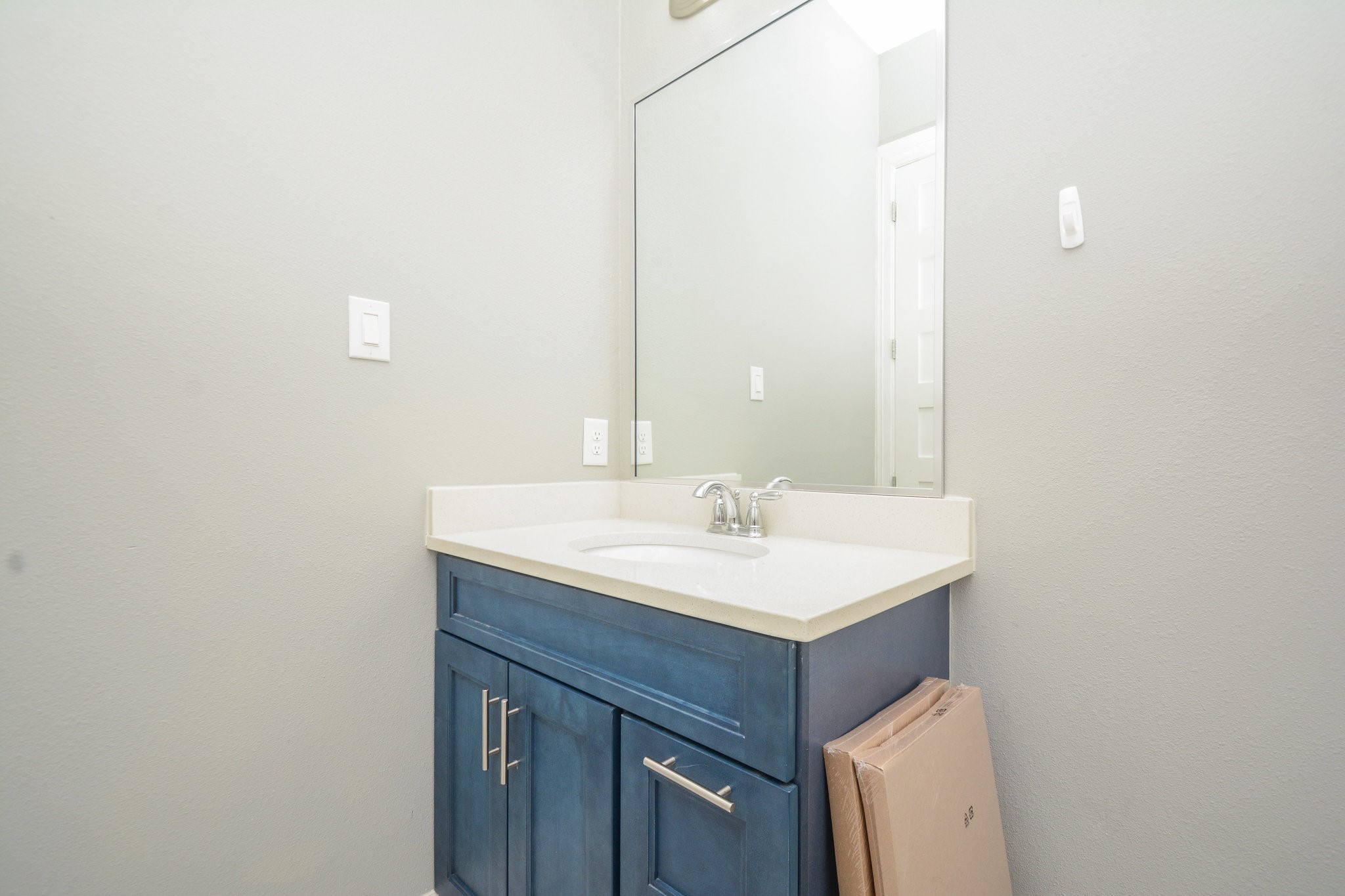 5513 Lotus Street Houston, TX 77085 - Photo 45 of 50 a bathroom with a sink and a mirror